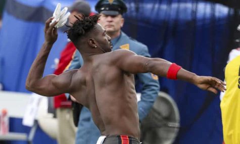 Wide Receiver Antonio Brown rips jersey, shoulder pads and undershirt off before storming off of the field during the Buccaneers/ Jets game earlier this month.