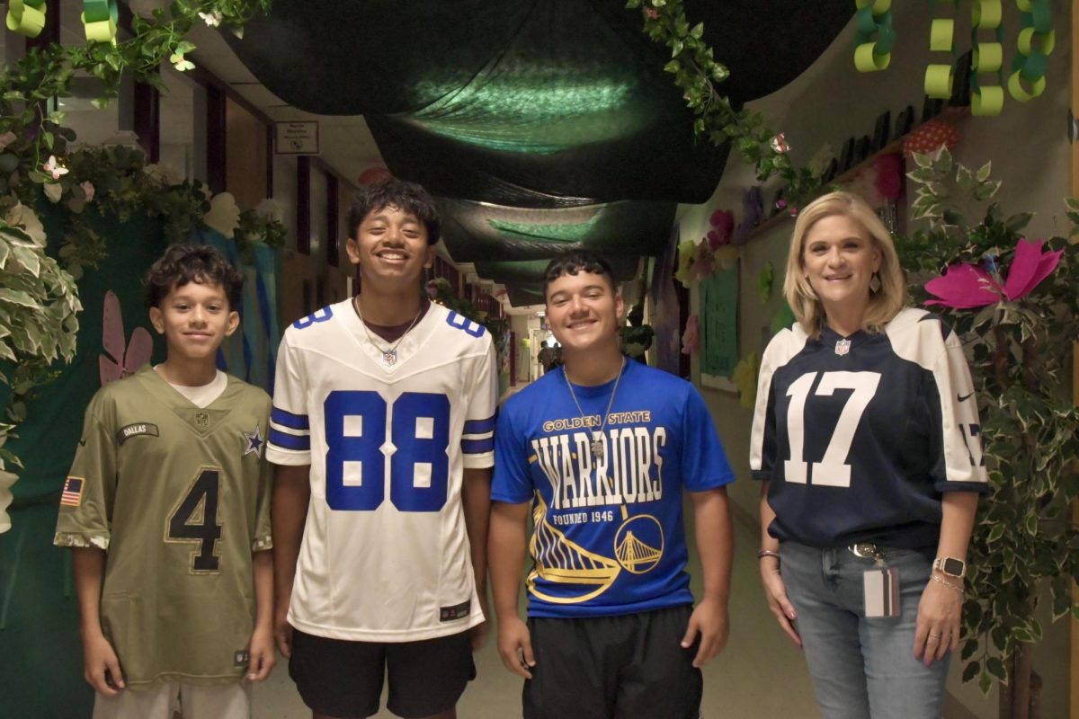 Students pose with DHS Student Council Sponsor Christina Morales whose student team leads the HOCO 2025 festivities this year.