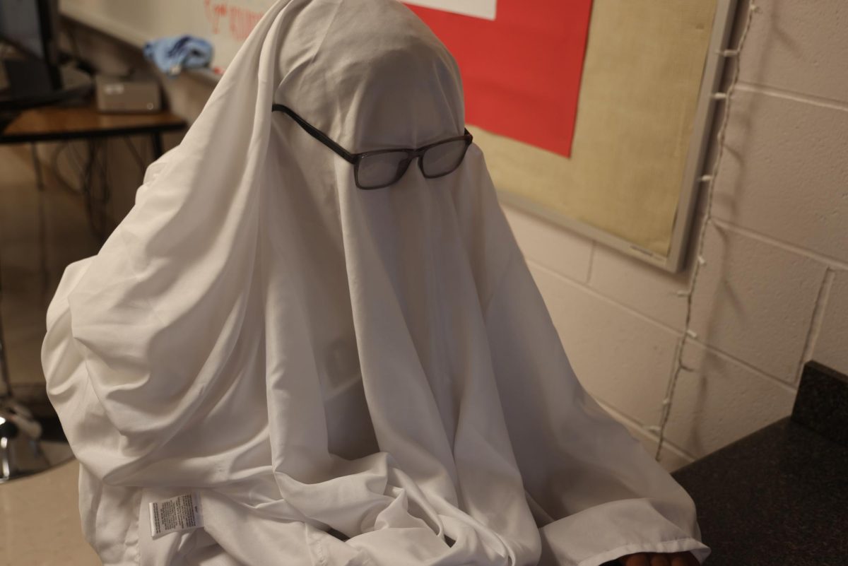 Students busy themselves searching for the best creepy stories to share with their viewers.
